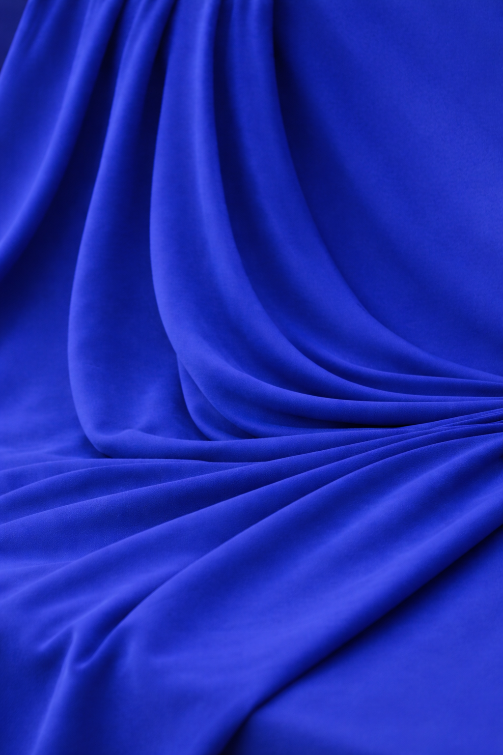 Gros plan sur le tissu hijab jersey bleu électrique, texture fine, fluide 